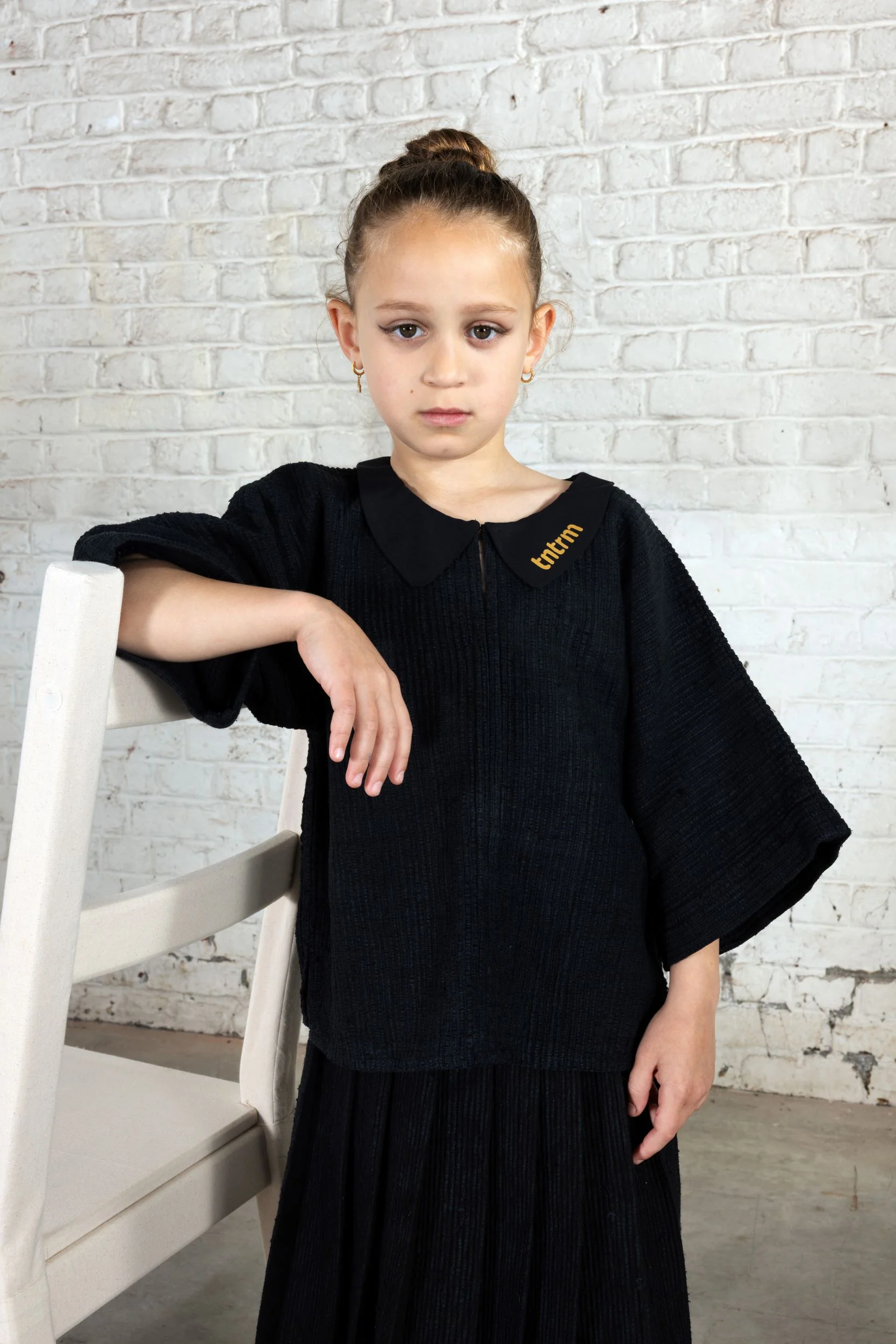 TNTRM BLACK WOVEN FLUTTER SLEEVE TOP [FINAL SALE] - Image 2